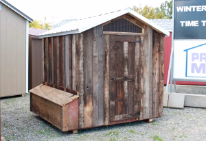 rustic, sturdy chicken coop made of reclaimed barn wood